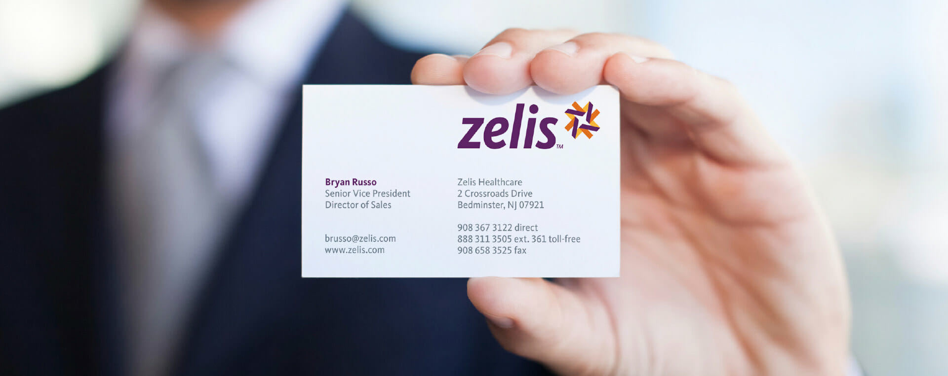 Zelis business card