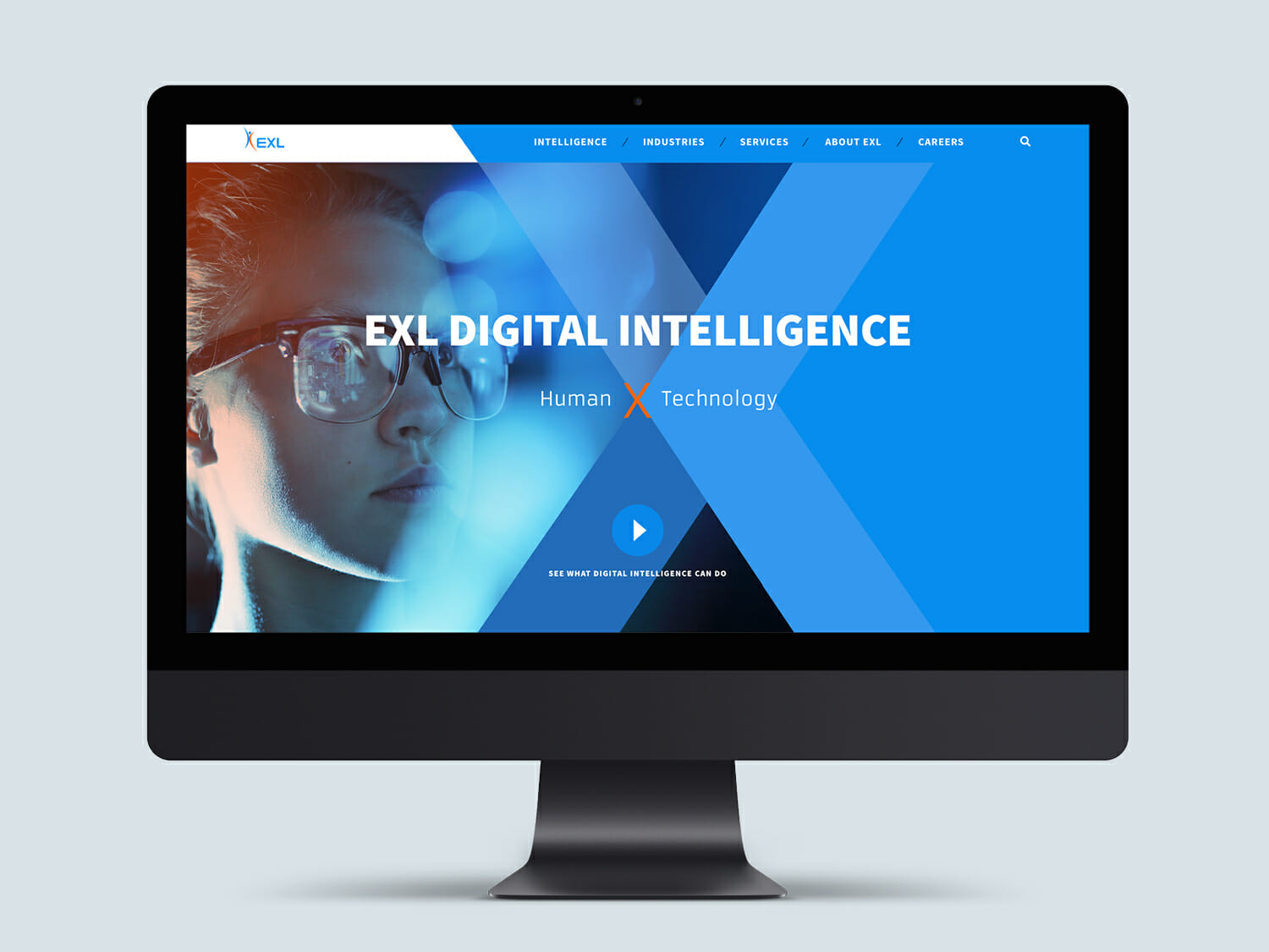 exl digital intelligence home page shown on desktop, woman with glasses