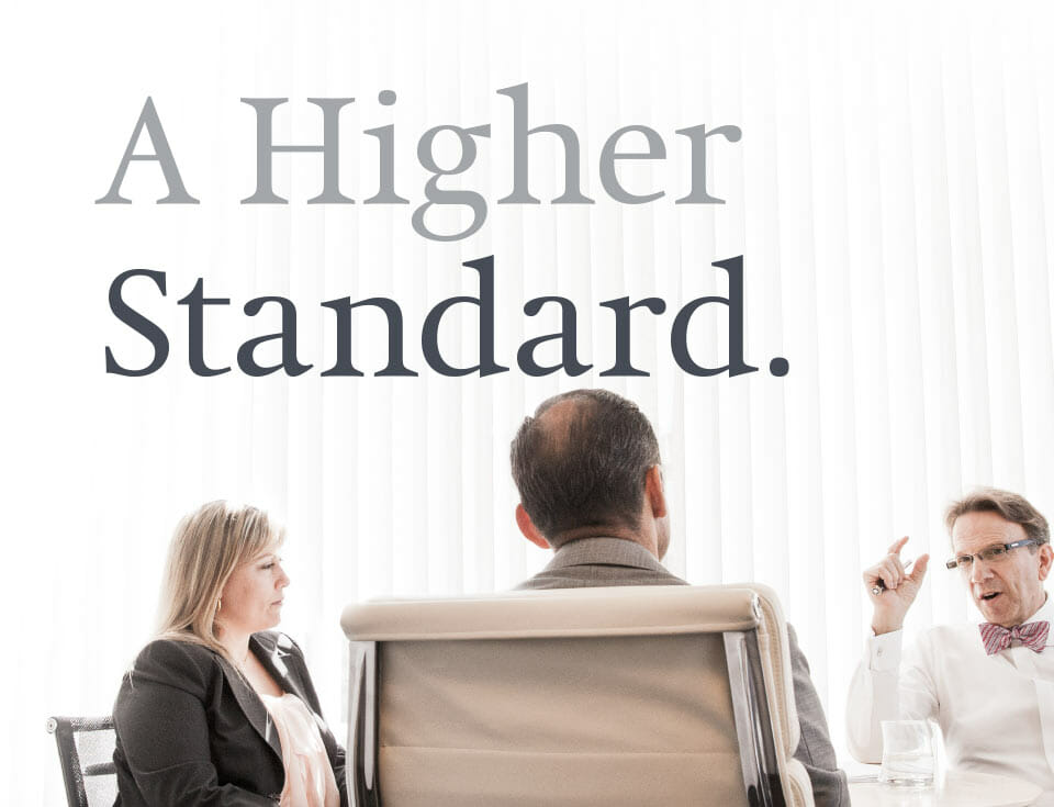 people in a meeting text overlay reads "a higher standard"